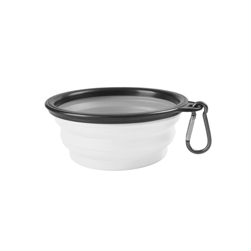 Collapsible white dog bowl with black rim and carabiner on a white background
